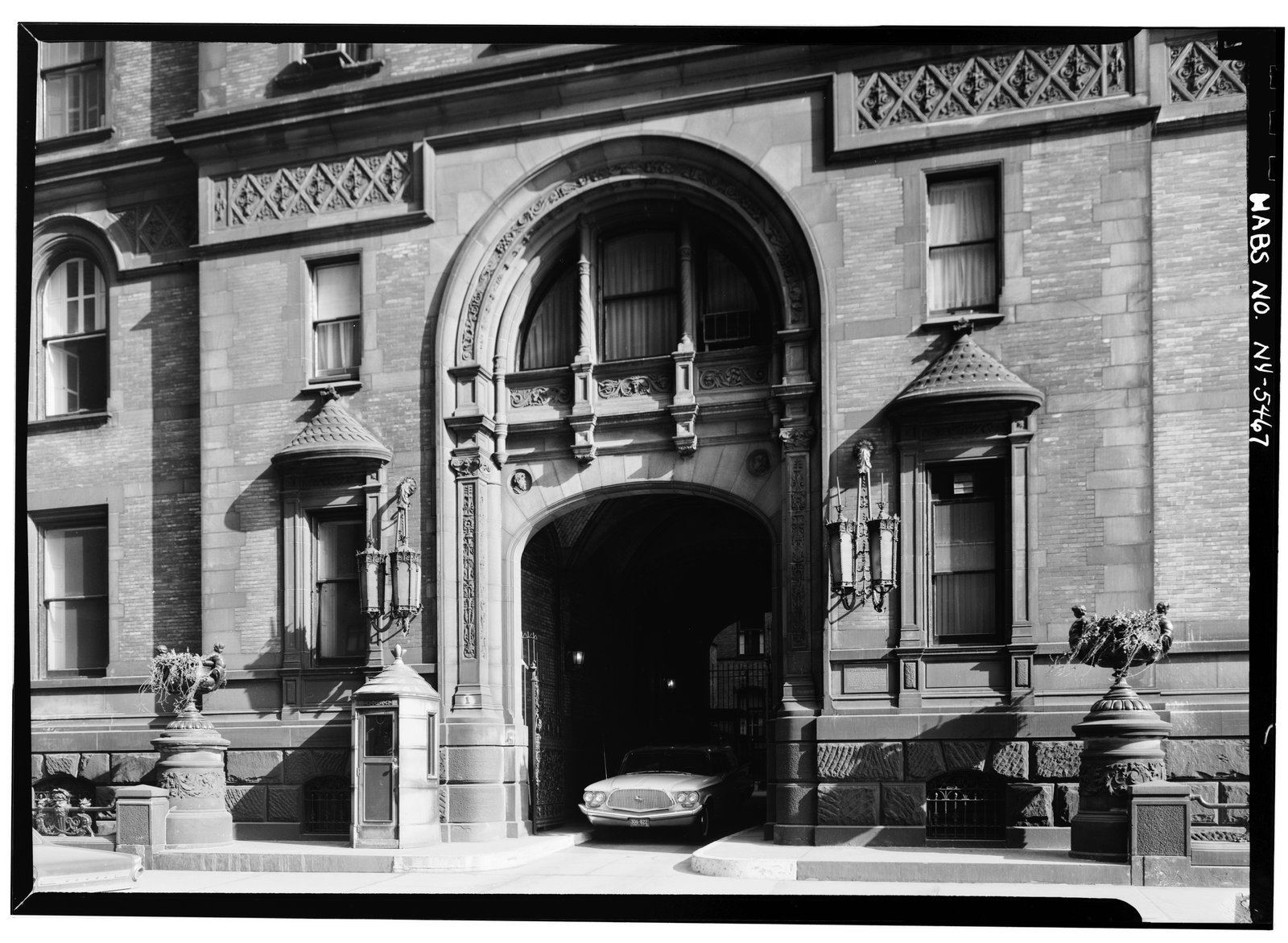 The Dakota's arched 72nd Street entrance in 1965 — the Bramford's fortress-like entry from Rosemary's Baby.